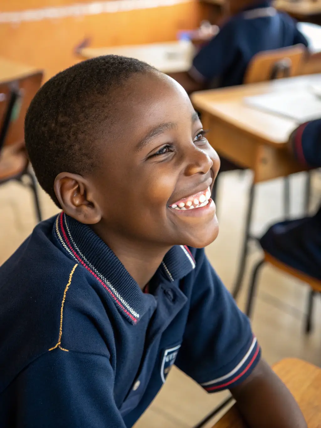 Students in school uniforms in a classroom and outdoor setting, showcasing MAJARA MIRDIF SEWING's ability to provide comfortable and stylish school uniforms.